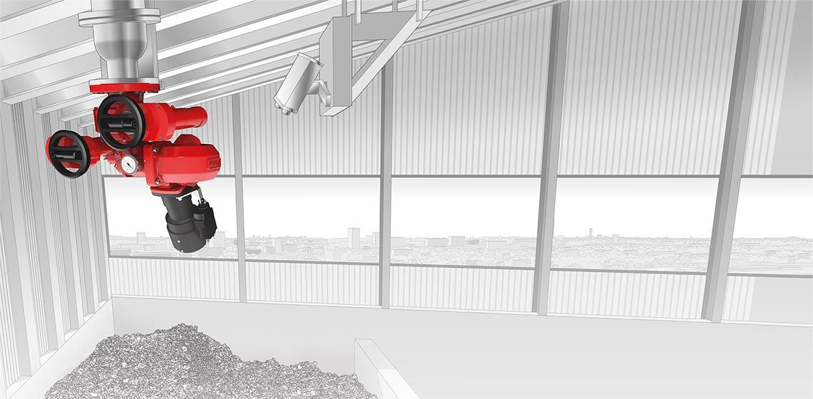 FireDos fire monitor and IR camera above a waste bunker for automatic early fire detection